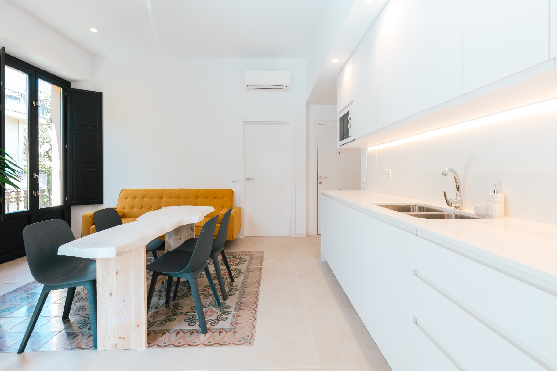 Kitchen with yellow sofa
